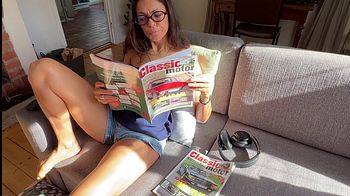 I was chillin’ reading my cars’ magazine when my hubby decided to fuck my pussy with my big dildo